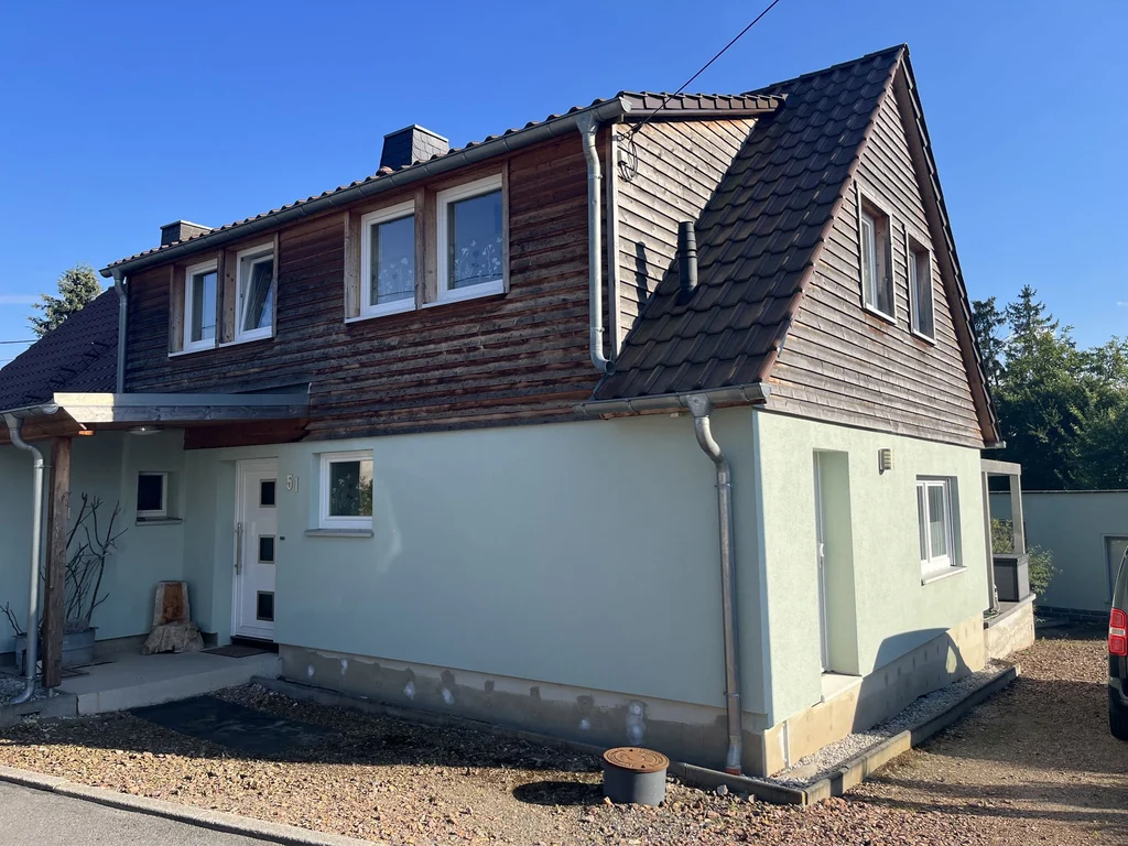Charmantes Einfamilienhaus mit großzügigem Garten und modernen Extras