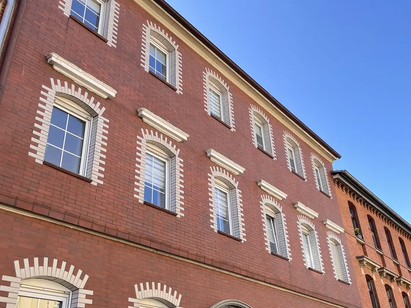 Moderne Eigentumswohnung mit Balkon und exklusivem Privatgarten im ruhigen Innenhof